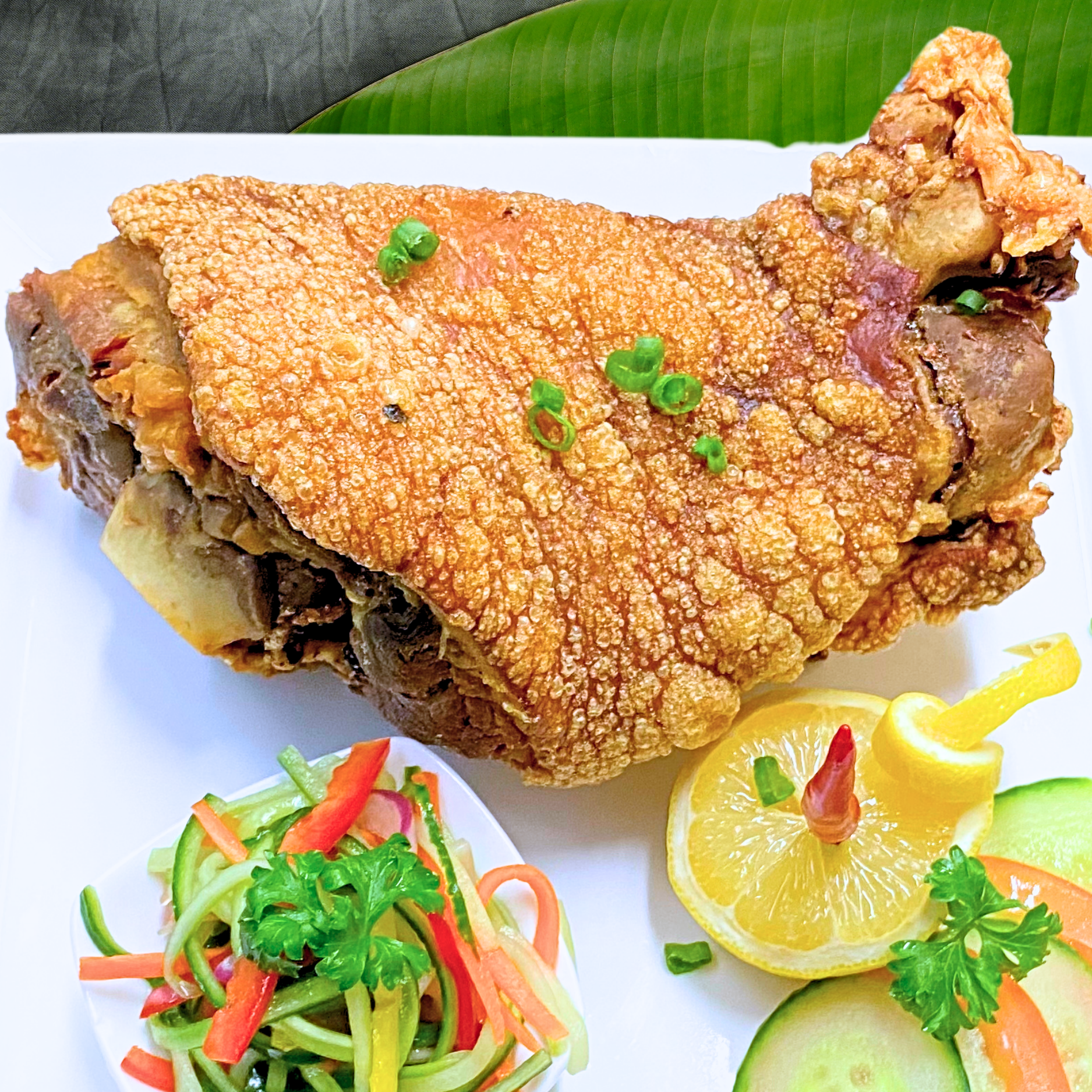 Crispy Pata - Deep-fried pork knuckle with crispy skin and tender meat